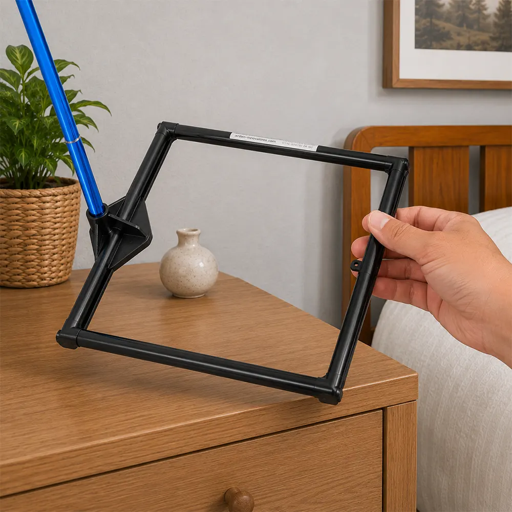 Hand holding adjustable tablet stand on wooden nightstand